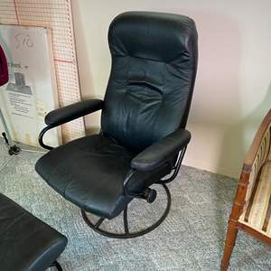 Lot #325 - Chair with ottoman