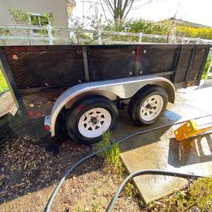 Lot #2 - Trailer, 10’ long box, double axle, drop ramp tailgate, in nice shape