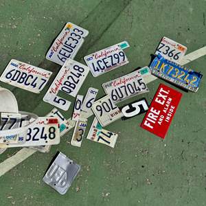 Lot #7  - Bucket of license plate scraps. Great for crafting 