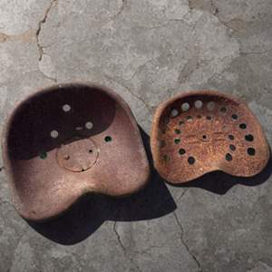 Lot #20  - Antique tractor seats 