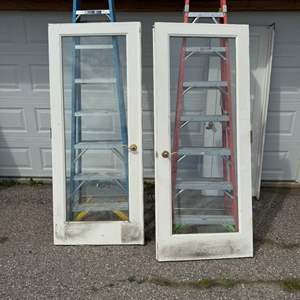 Lot #100  - Pair of glass french doors 