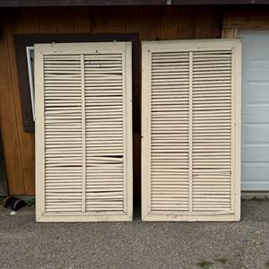 Lot #111  - Pair of vintage rustic shutters on wheels, great upcycle project! 100+ years old