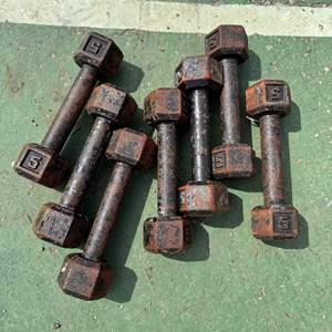 Lot #128  - 7 vintage 5lb dumbbells 