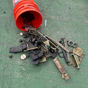 Lot #132  - Bucket filled with really cool brass hardwares and parts. Great for projects 