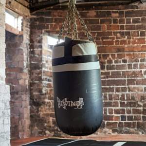 Lot #190  - Punching bag with boxing gel gloves 