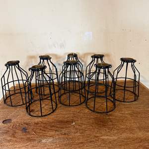 Lot #203  - Set of 8 accent industrial design light bulb guards 