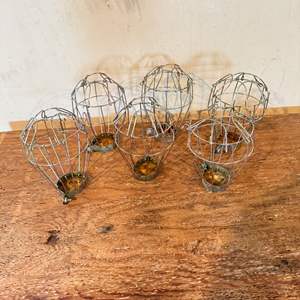 Lot #204  - Set of 6 metal lamp bulb guards 