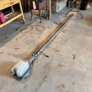 Lot #211  - Genie Lift Master Garage Door Motor and rail with remotes