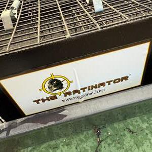 Lot #253  - “The Ratinator” live animal trap. Like new 