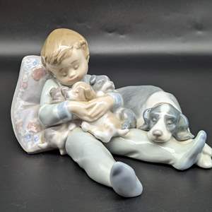 Lot #9 - Lladro "Sweet Dreams" Boy with Dog and Puppies