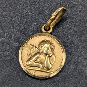 Lot #123 - 10k Gold Pendant (.9g)