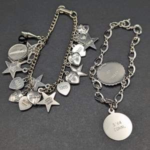 Lot #157 - Sterling Silver Charm Bracelets (Some Charms Steel)