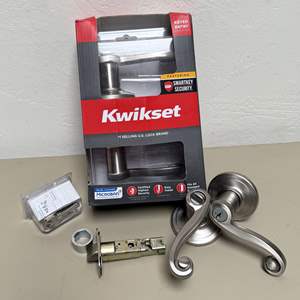 Lot #206 - (2) Matching Kwikset Door Handles Kit