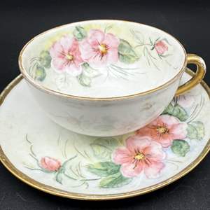 Lot #303 - Signed Hand-Painted Bone China Teacup and Saucer