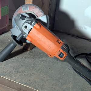 Lot #334 - RIDGID 15 Amp Corded 7 in. Twist Handle Angle Grinder-R10202