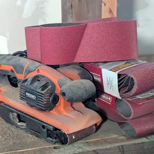 Lot #338 - RIDGID R2740 Heavy Duty Variable Speed Belt Sander 3 in. x 18 in & Belts 