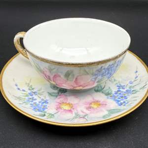 Lot #308 - German Bone China Teacup and Saucer