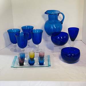 Lot #26- Cobalt Blue Glassware: Pitcher, Bowls, Goblets, & Shot Glasses