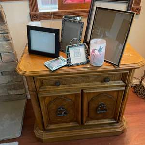 Lot #111- Solid Wood Side Cabinet & Assortment of Picture Frames