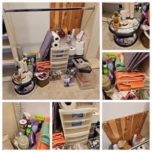 Lot #275- Misc Bathroom finds.  CLEANERS, TP, Storage  BINS, Hand Towels Candles