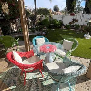 Lot #350- Brylane Home Glasstop Table W/(4) Wicker Chairs, & Outdoor Rug