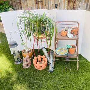 Lot #359- Potted Plants, Yard Art, Bird Feeders, Step Stool, & More