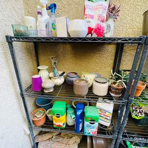 Lot #377- Outdoor Utility Rack With Contents: Pots, Plant Food, & More