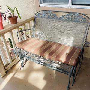 Lot #381- Cast Aluminum Glider Love Seat With Cushion