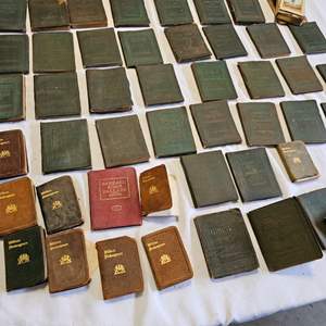 Lot #450- XL Lot of 1920’s Mini Leather Books