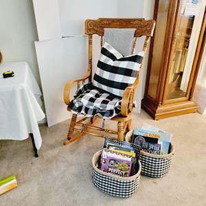 Lot #10- Vintage Wood Rocking Chair with Matching Buffalo Check Pillow/Cushions and Basket with Books