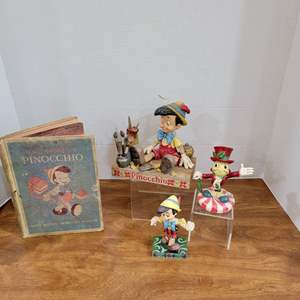 Lot #31- Collectable Disney Pinocchio Lot; Book and Figurines