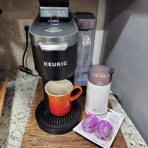 Lot #50- Keurig , Braun Coffee Grinder, Collection of Mugs