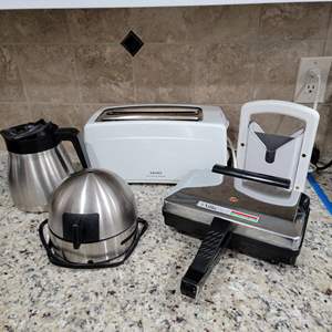 Lot #57- Kitchen Electronics and Gadgets ; Bagel Slicer, Toaster, Pizzelle Baker and More 