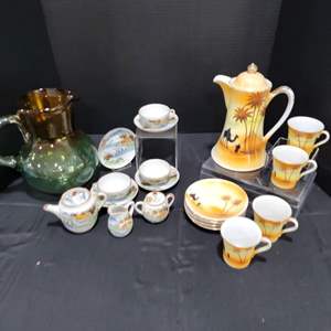 Lot #99- Japanese Coffee Pot W/4 cups/Saucers, Golden Brand Toy Tea Set, & Large Pitcher  