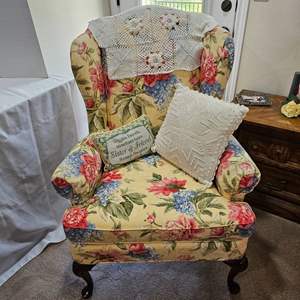 Lot #155- Floral Wing Back Sitting Chair by Woodmark With Decor Pillows