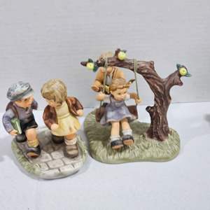 Lot #257- (2) Goebel Figurines: “Just A Swinging”, & “Catching Up”