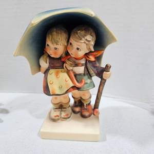 Lot #259- Goebel Hummel “Stormy Weather” Figurine RARE FIND