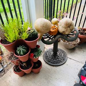 Lot #327- Vintage Cast Iron Tractor Seat & Potted Succulents 